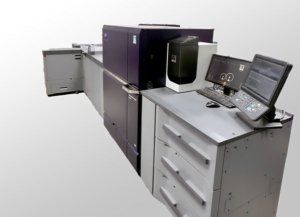 One of DocuCopies.com's new Konica Minolta C14010 digital color presses and finisher